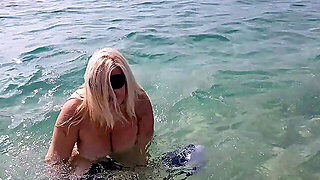 Streptease On A Nude Beach